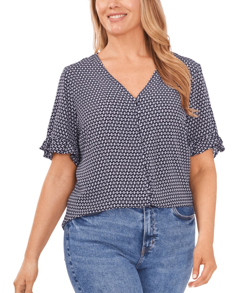 Front of a model wearing a size 1X Arya Ruffled Sleeve Blouse in CAVIAR by CeCe. | dia_product_style_image_id:263324